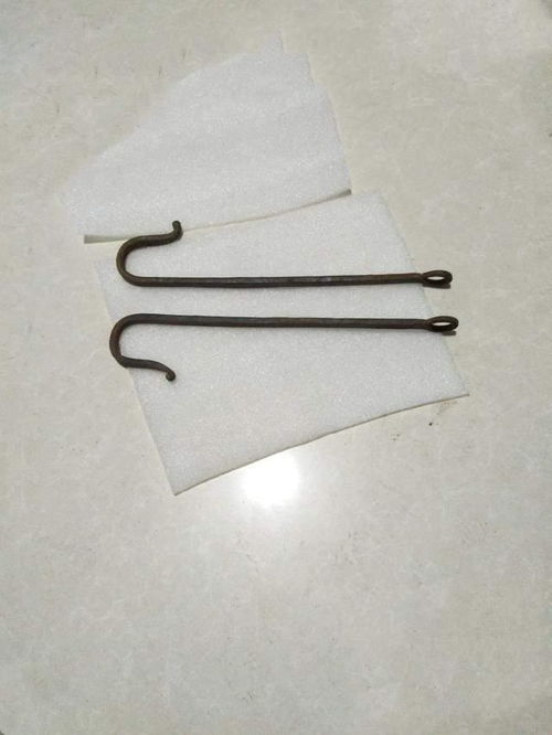河北农村有唤头 字板和针笔等老工具,它们的用途一般人不知道